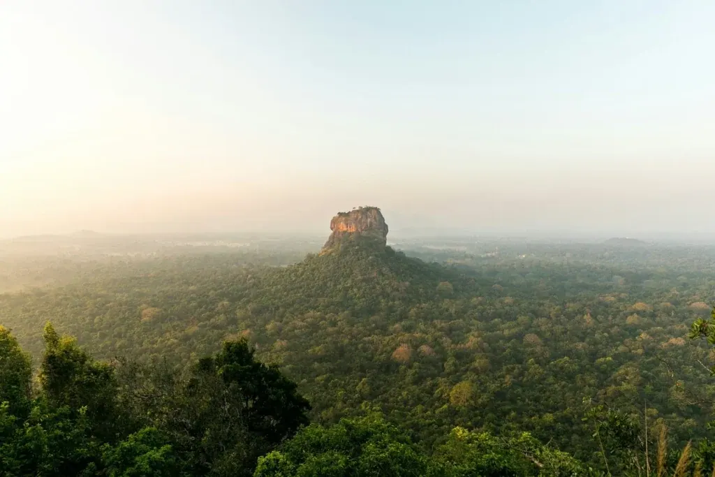 Sigiriya Lion Rock standing above the surrounding jungle canopy