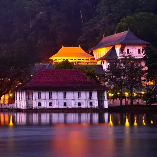 Carved and painted detail on the shrine housing the sacred tooth relic in Kandy